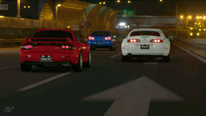 夜の道路を走るJDMカー