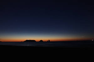 夕焼けと星空、海の壁紙