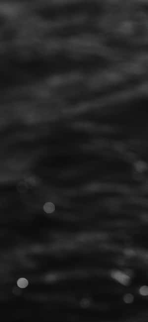 ブラックのぼかし背景 — POCO C95 Pro 壁紙
