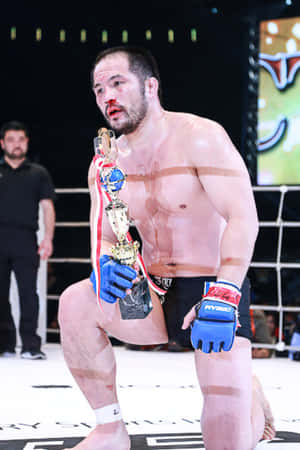 日本のMMAファイター 桜井速人 血まみれの顔 — Huawei MatePad 11.5 (2026) 壁紙