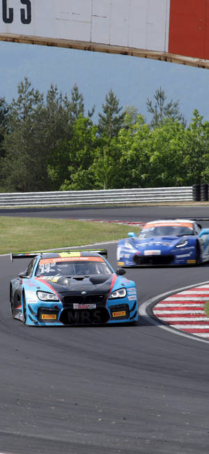 青いBMW M6 GT3 レースカー iPhone — Galaxy S24 壁紙