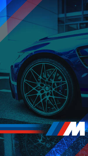 青い車のタイヤとBMW Mロゴの壁紙 — BMW 壁紙